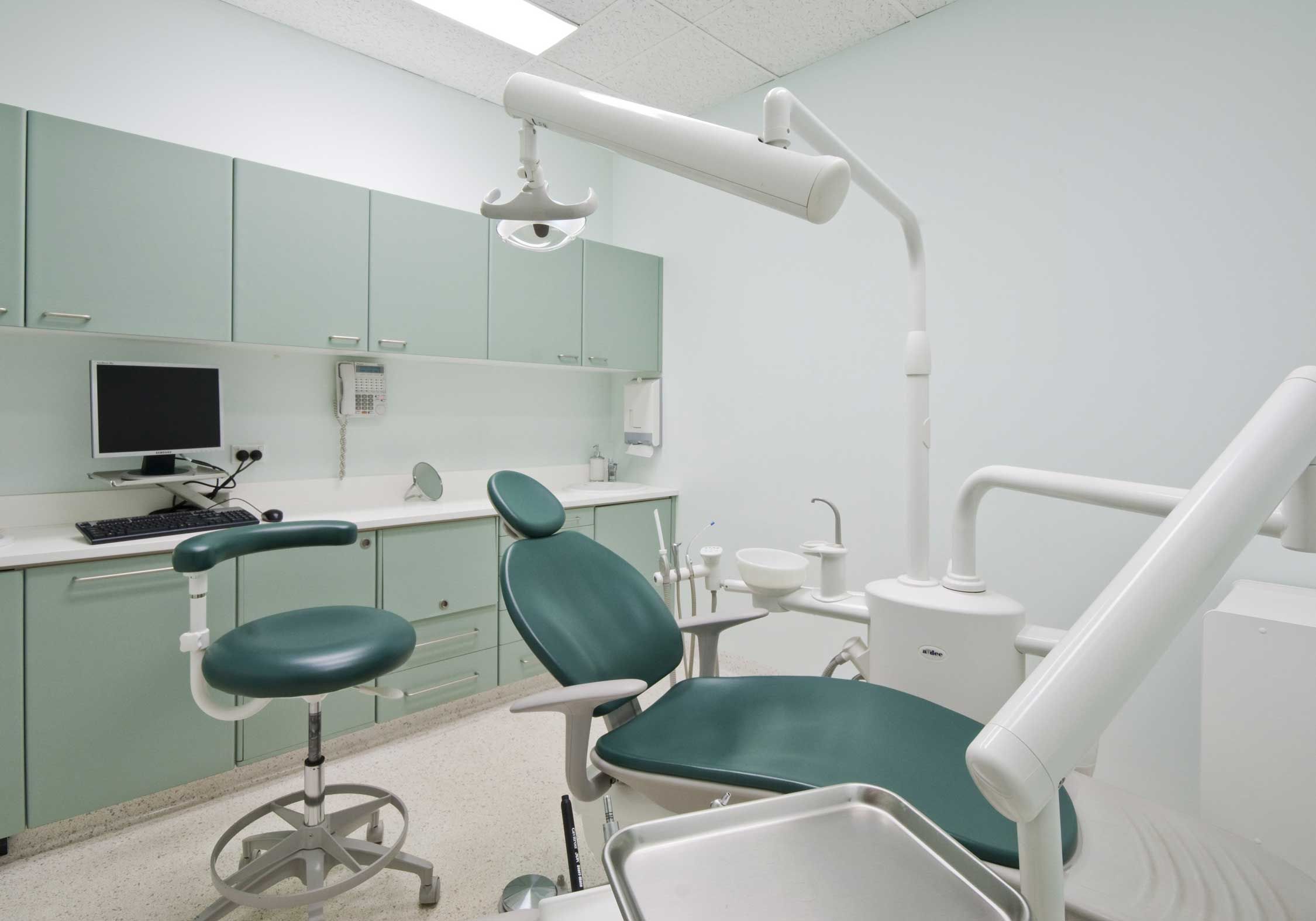 dentist office, green cabinets, computer